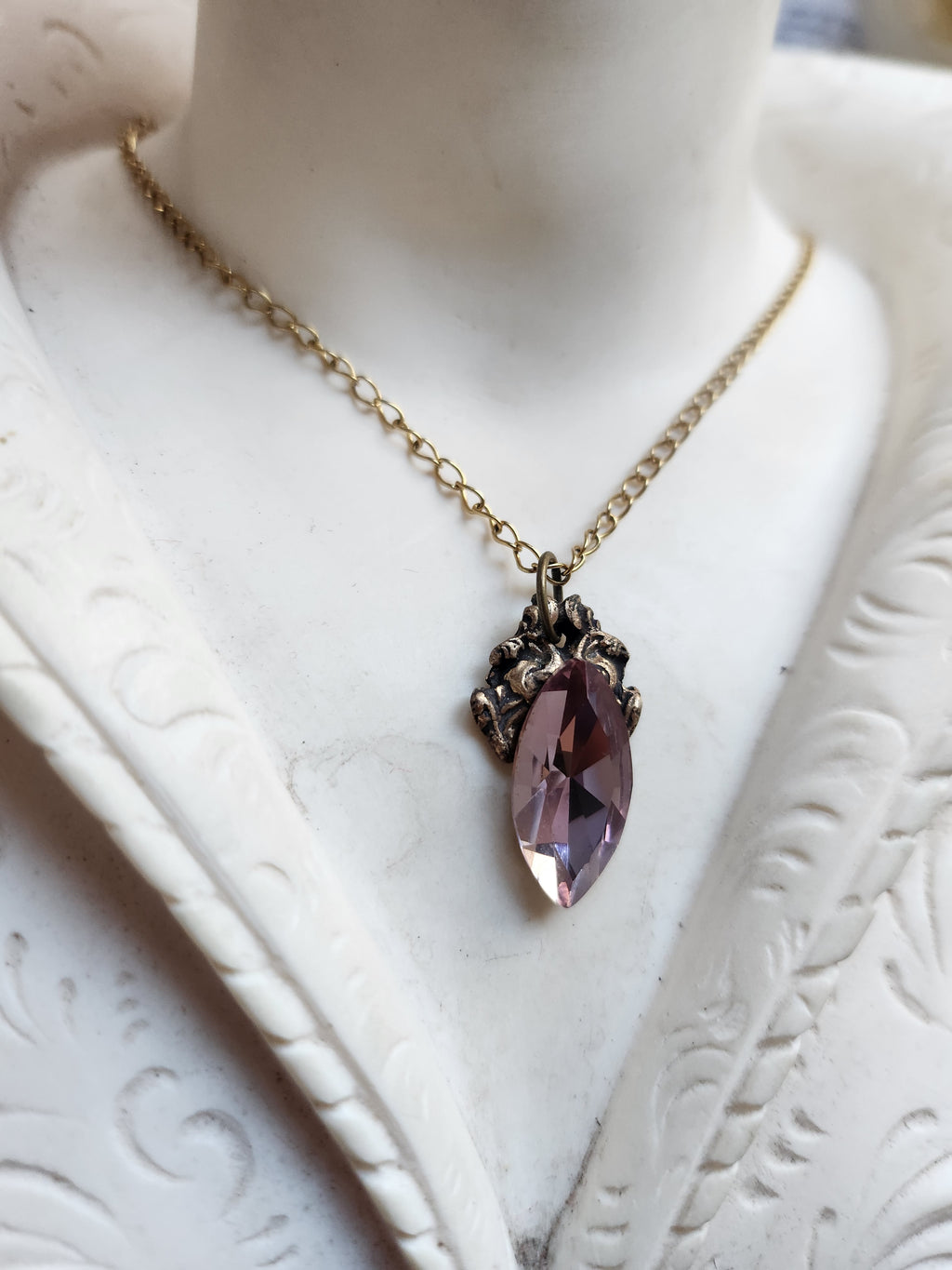 Arcane Resonance Collection – Handmade Bronze Pendant with Dusty Rose Navette Crystal