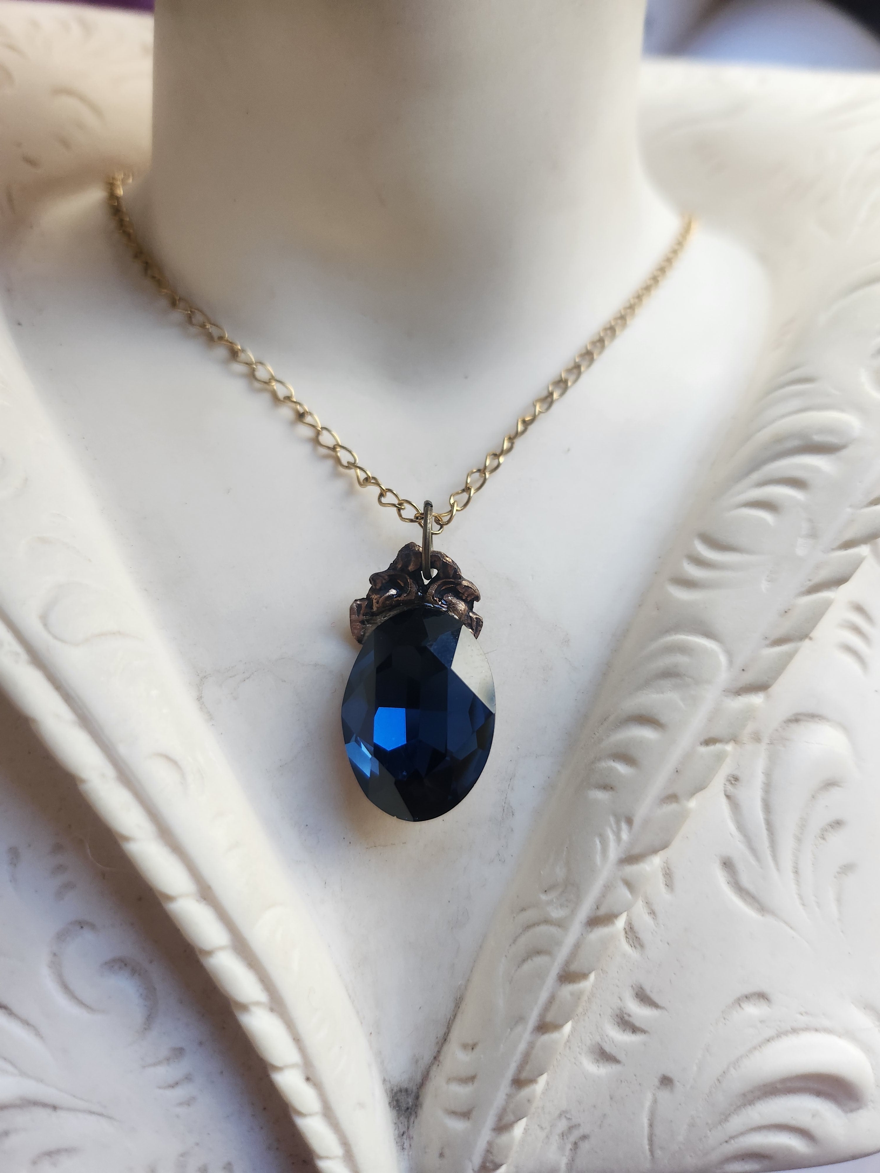 Arcane Resonance Collection – Small Handmade Bronze Pendant with Deep Blue Oval Crystal