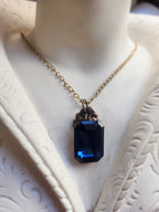 Arcane Resonance Collection – Handmade Bronze Pendant with Deep Blue Octagon Crystal
