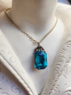 Arcane Resonance Collection – Handmade Bronze Pendant with Electric Blue Octagon Crystal