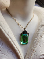 Arcane Resonance Collection – Handmade Bronze Pendant with Green Octagon Crystal