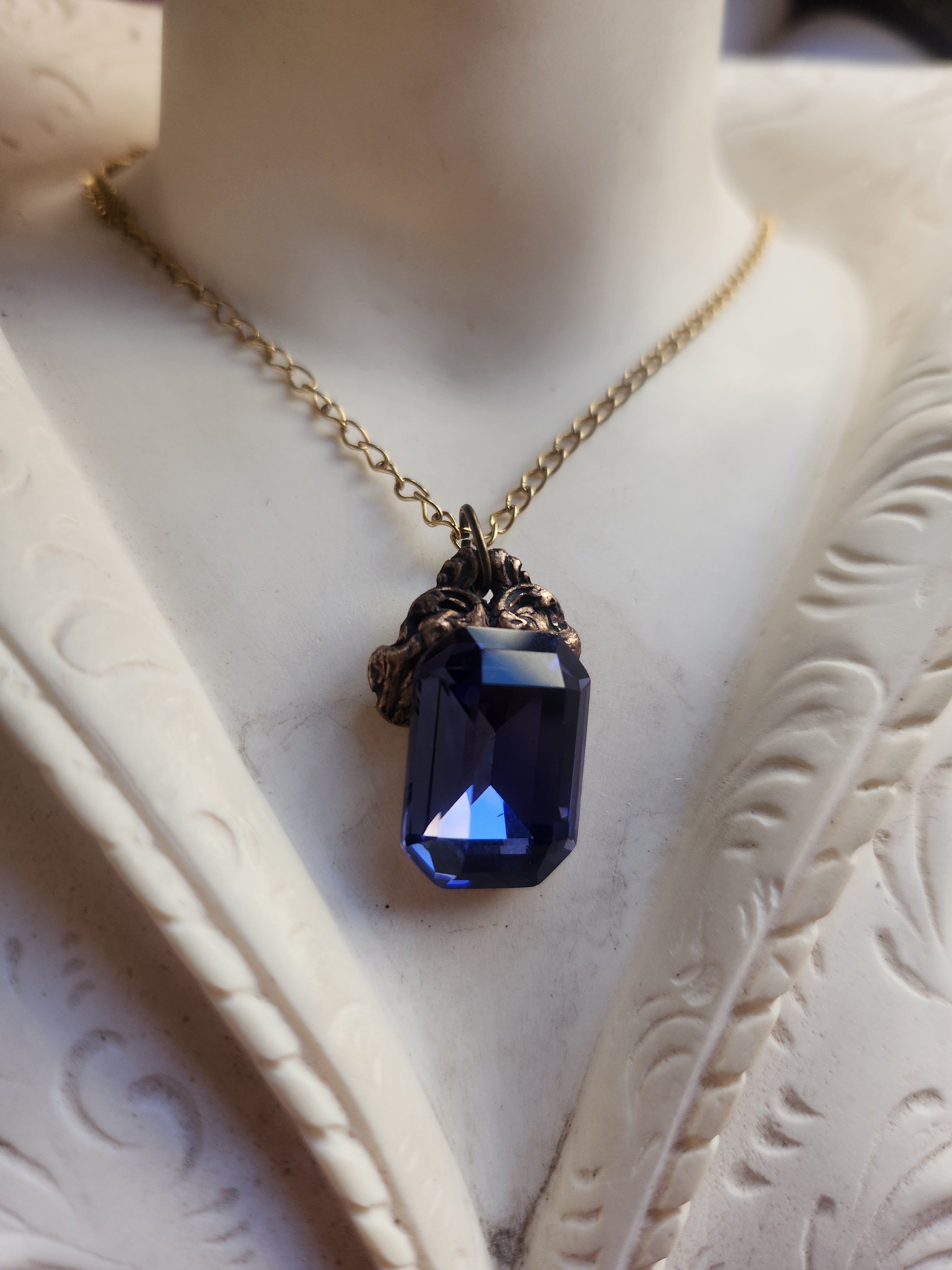 Arcane Resonance Collection – Handmade Bronze Pendant with Sapphire Blue Octagon Crystal