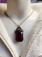 Arcane Resonance Collection – Handmade Bronze Pendant with Deep Red Octagon Crystal