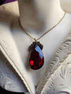Mystic Baroque Collection – Handmade Bronze Pendant with Deep Red Teardrop Crystal