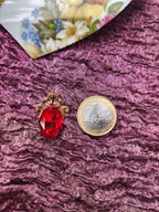 Coleção Ressonância Arcana – Pendente de cobre feito à mão com cristal oval vermelho