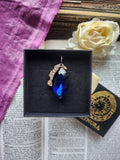 Mystic Baroque Collection – Handmade Bronze Pendant with Deep Blue Crystal Navette