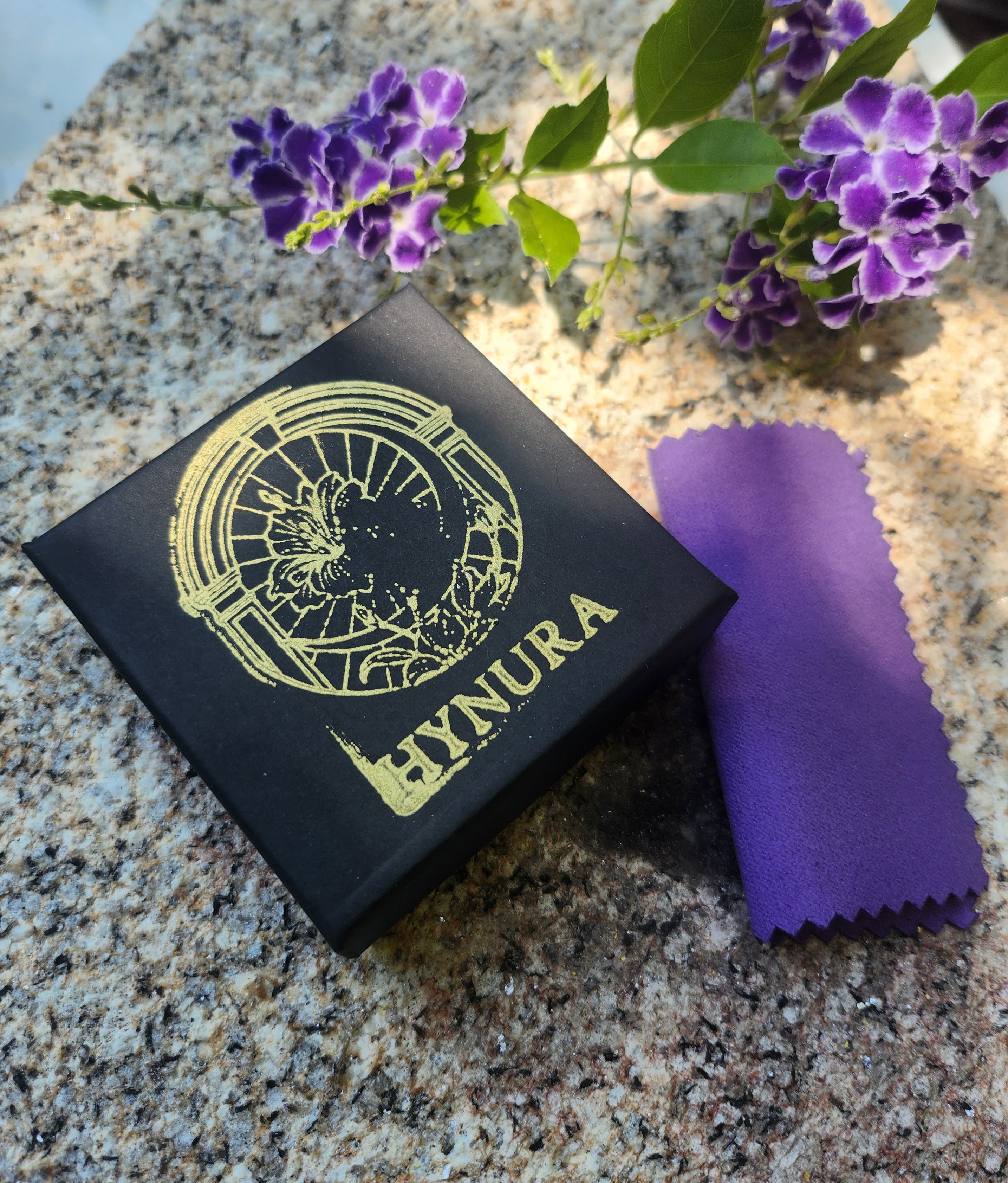 Eternal Bloom Collection – Handmade Bronze Flower Pendant with Light Blue Crystal